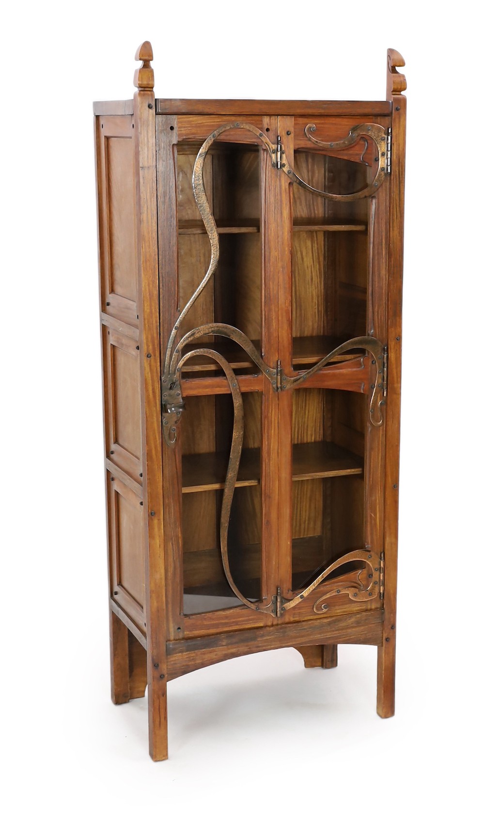 Gustave Serrurier-Bovy (Belgian 1858–1910). An Art Nouveau copper mounted red narra wood vitrine, width 68cm, depth 40cm, height 174cm